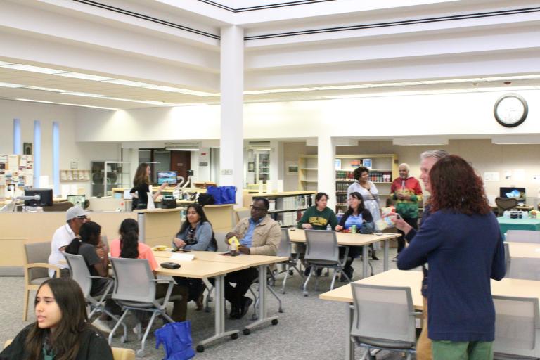Patrons socializing in the California Reading Room.