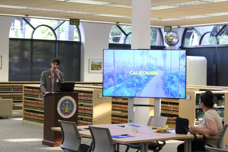 A library staff member presents trivia.