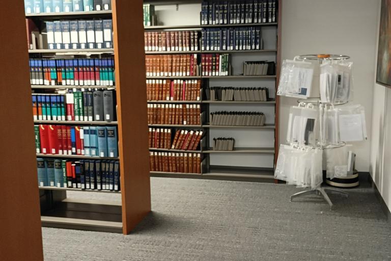 Bookshelves and MCLE rack at Palm Springs.