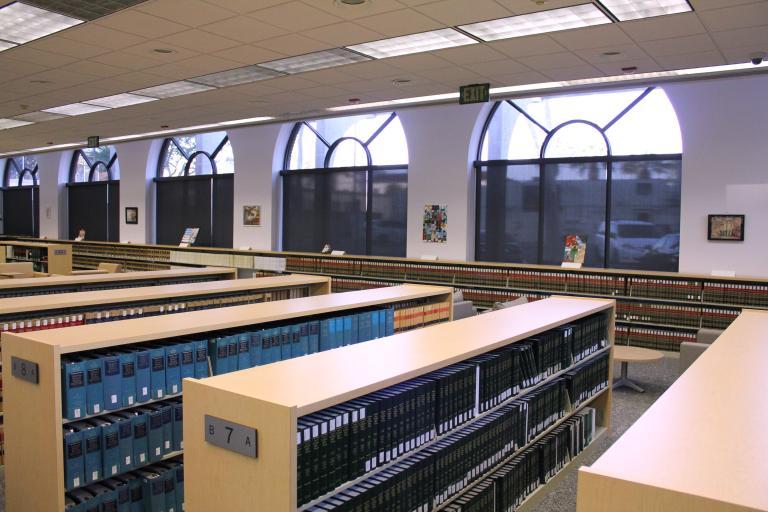 A selection of art contest entries line the wall of the California reading room.