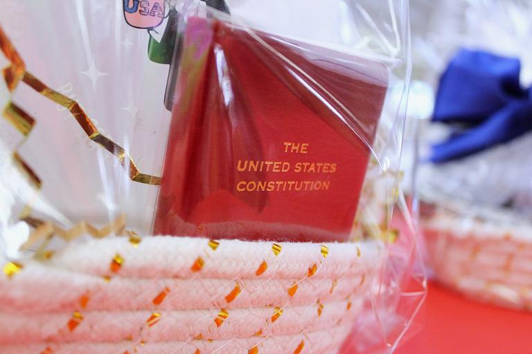 A pocket Constitution in a gift basket.