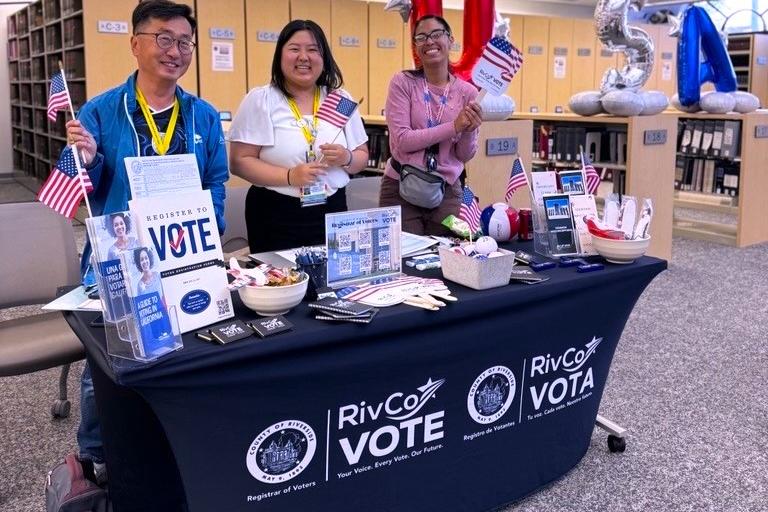 Representatives from the Riverside County Registrar of Voters at Trivia Night.