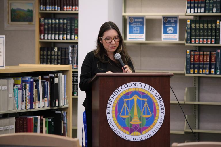 User Experience Librarian Andrea Valencia delivers opening remarks