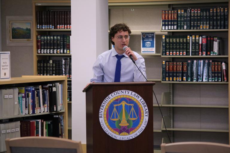 Panel moderator, Library Assistant Yanis Azzou, opens the discussion
