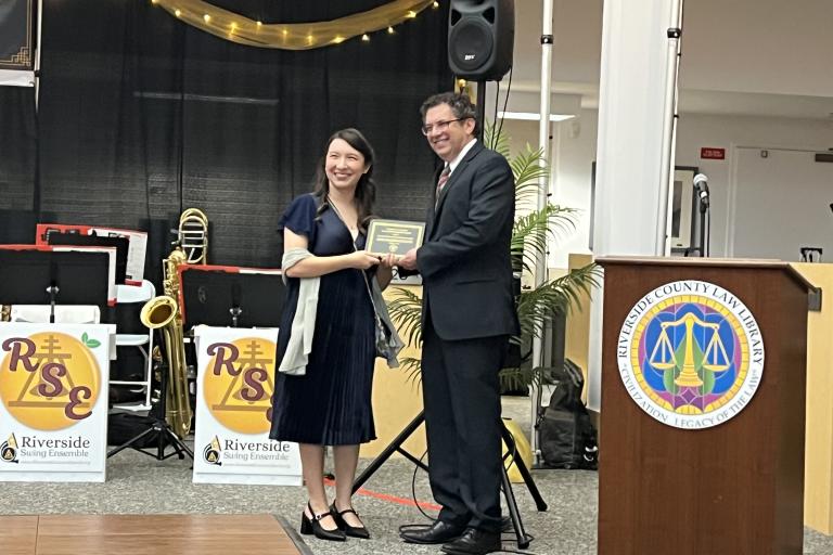 Southwest Riverside County Bar Association Board President Barak Berlin accepts the SWBCA's Community Partnership Award