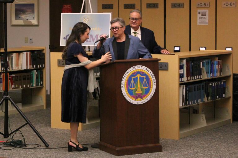 Past Board President Judge Michelle Levine accepts the Distinguished Service Award