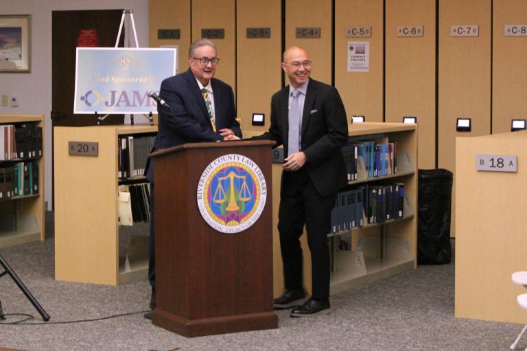 Past Board President Judge Jackson Lucky accepts the Distinguished Service Award