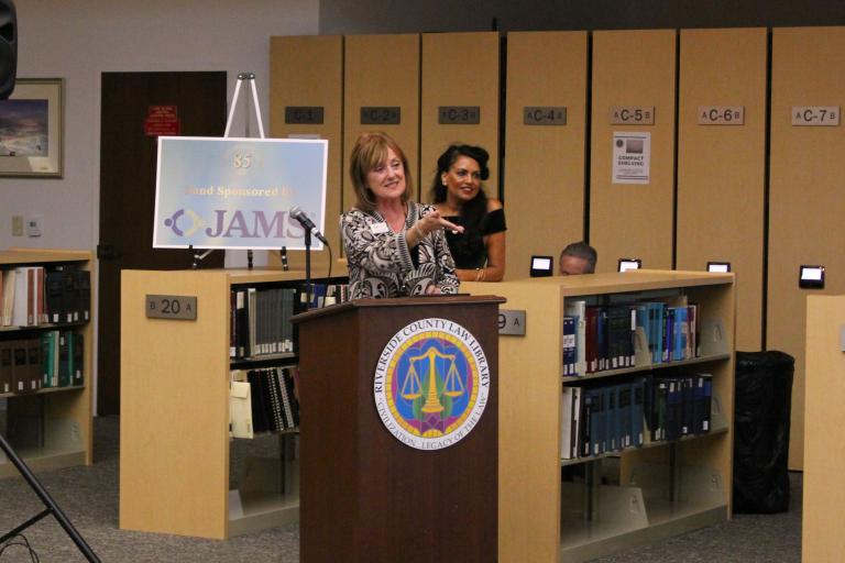 Branch Manager Ginger Safstrom accepts the Temecula Public Library's Community Partnership Award