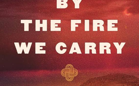 Cover of the book, "By the Fire We Carry" by Rebecca Nagle featuring a red-tinged Oklahoma landscape.