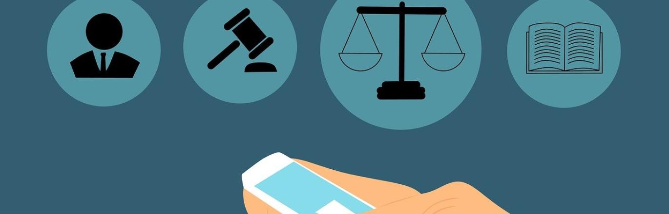 Illustration of hands using a smartphone with various legal icons displayed above.