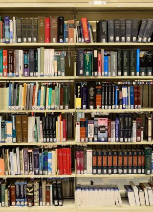 library shelving featuring rows of books