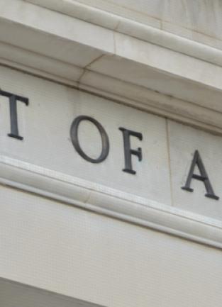 marble white building with"court of appeals" displayed